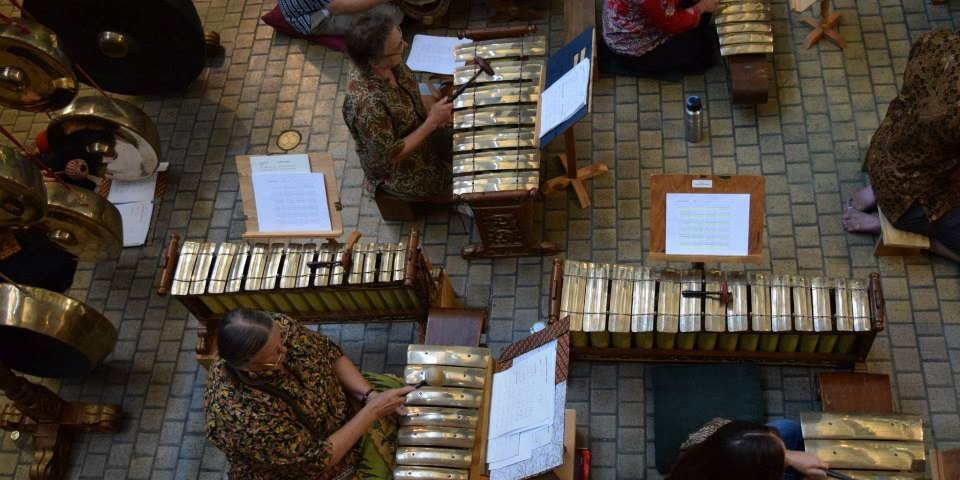 Image from above of the ensemble performing in a formation
